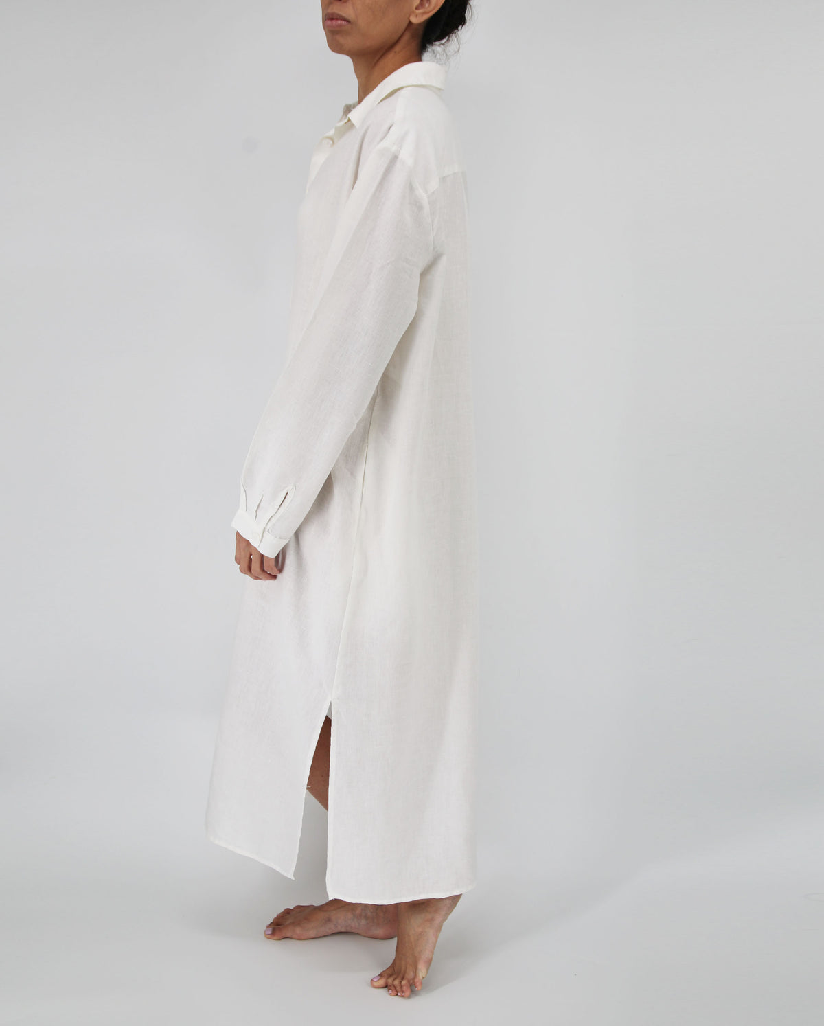 milk white long linen dress with mother of pearl buttons and side pockets