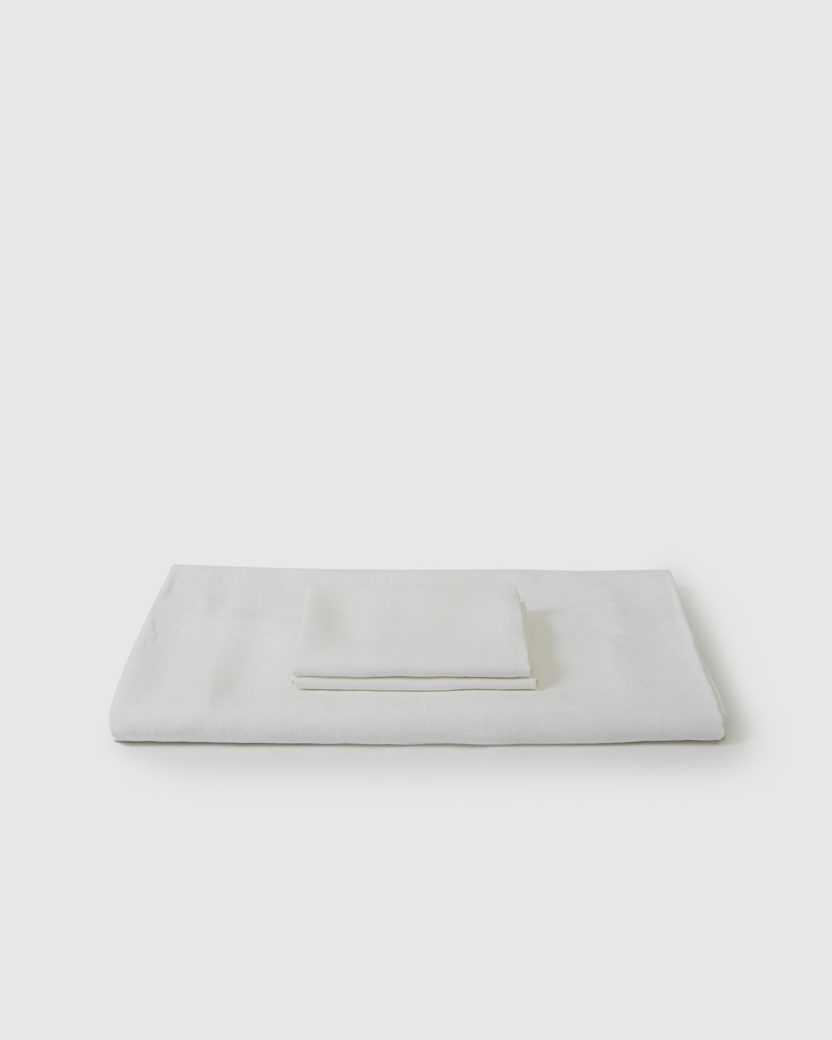 Linen duvet cover and pair of pillowcases in creamy white milk
