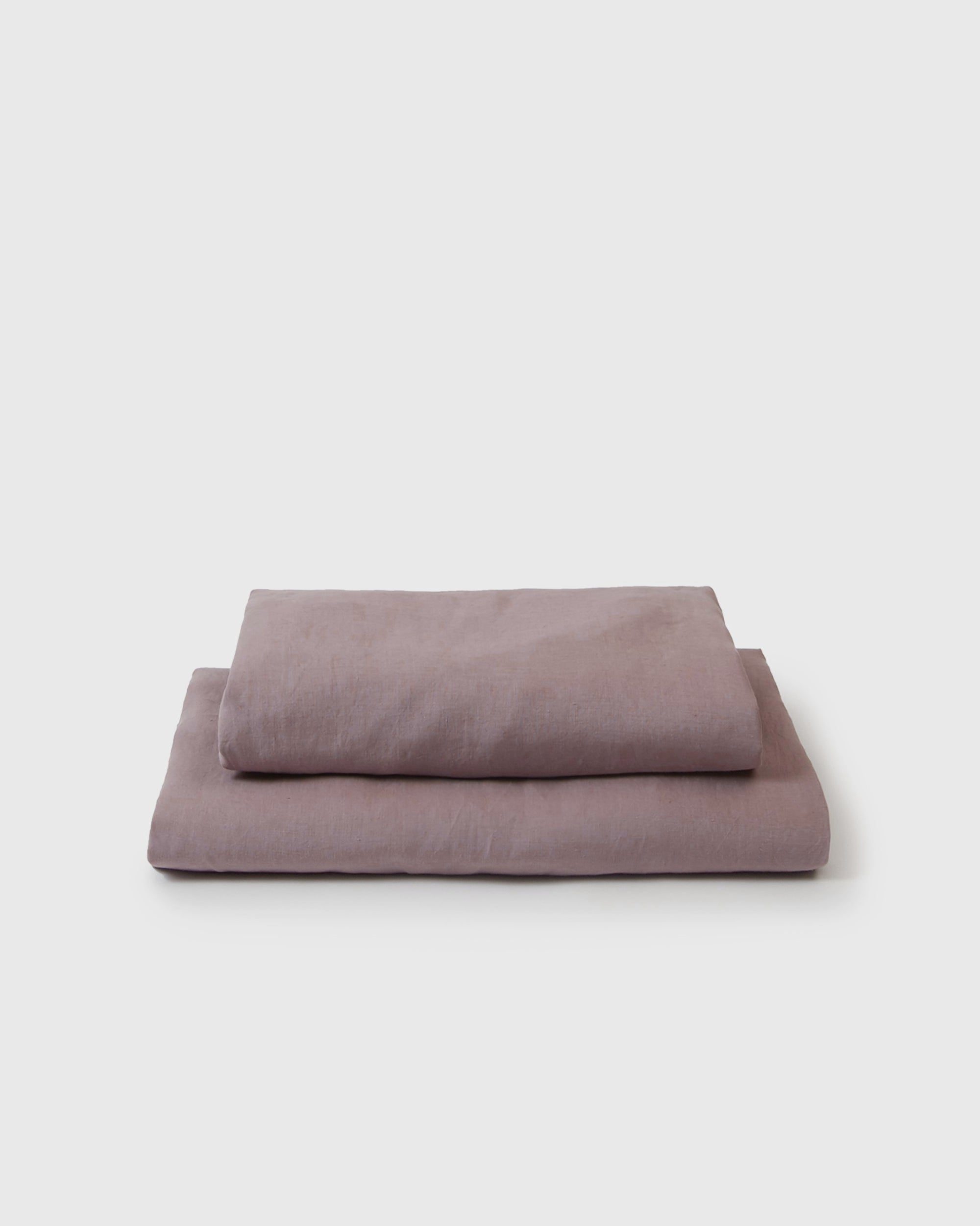 Image of dark pink orchid flat and fitted sheet set