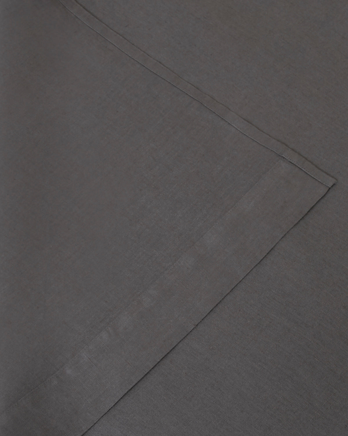 Image of dark gray storm flat and fitted sheet set