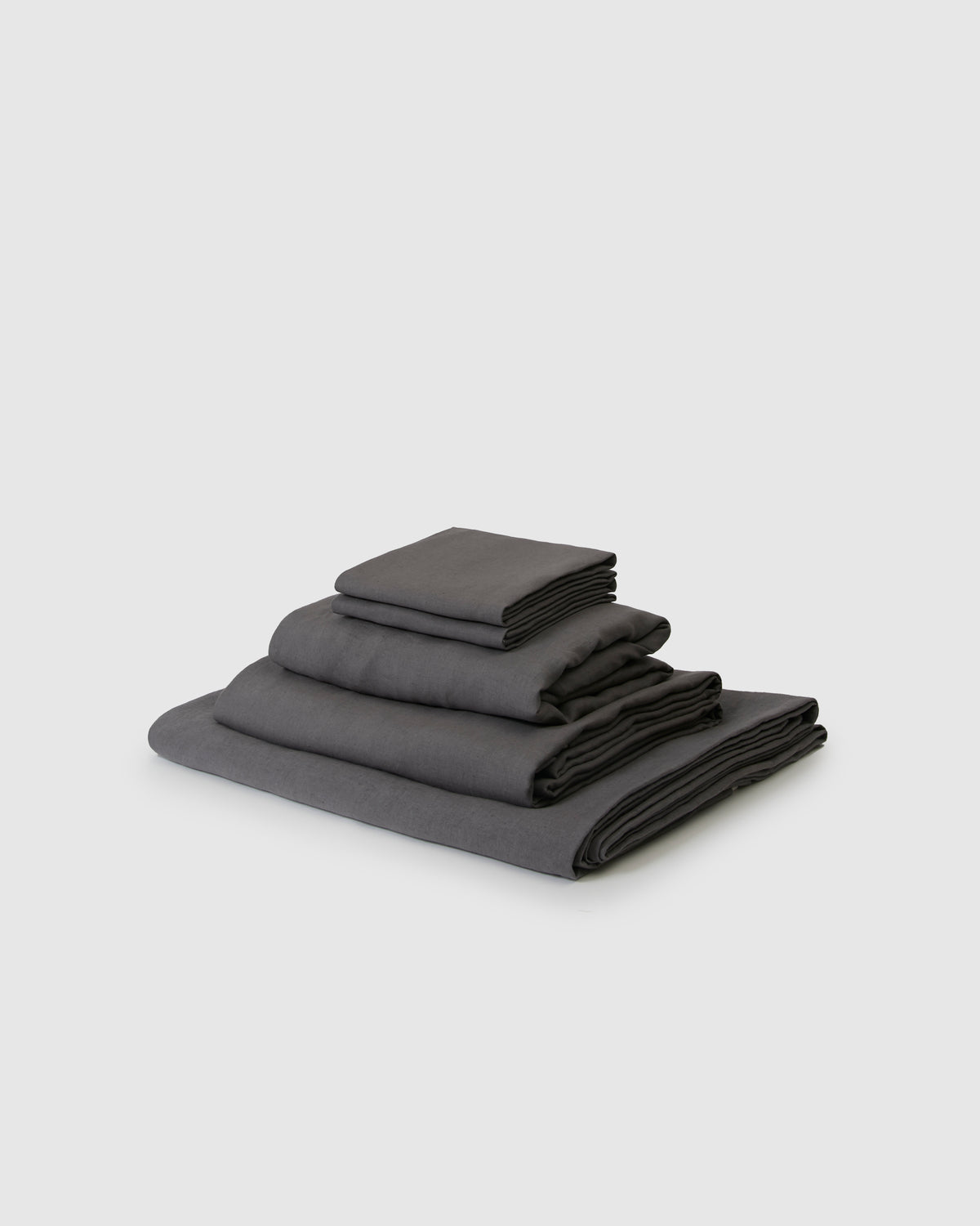 Side angle shot of a dark gray storm sheet set