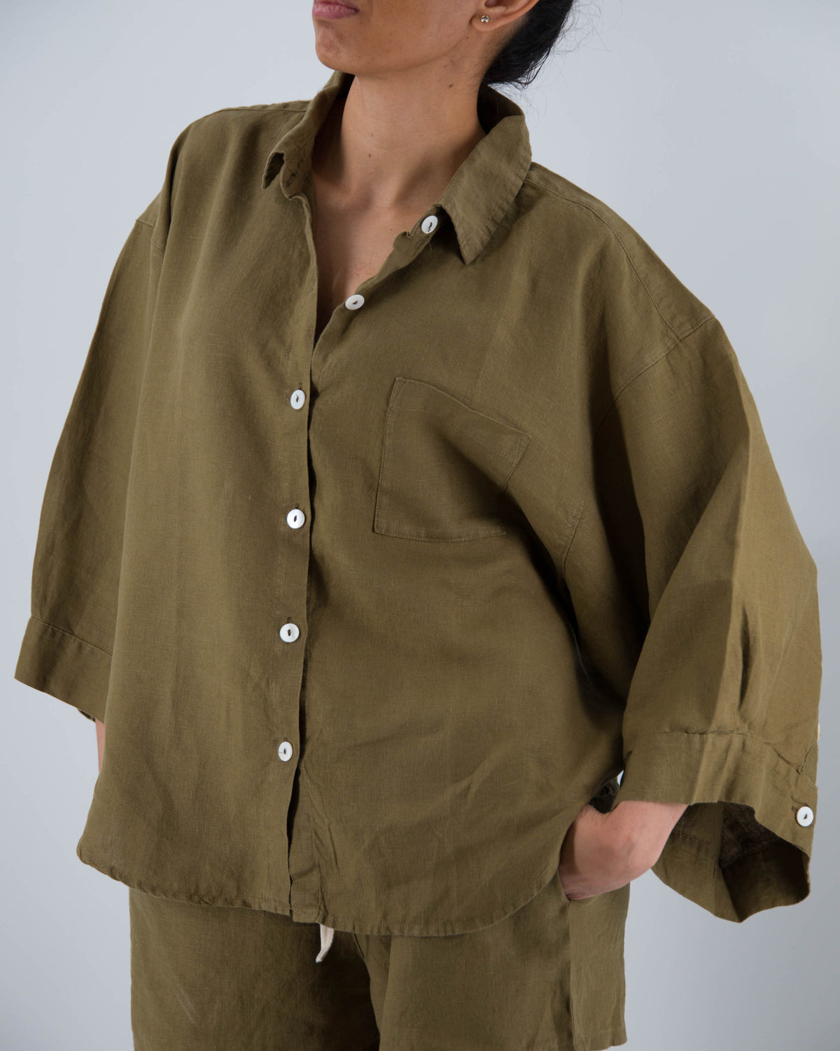 Moss green linen button down shirt with mother of pearl buttons