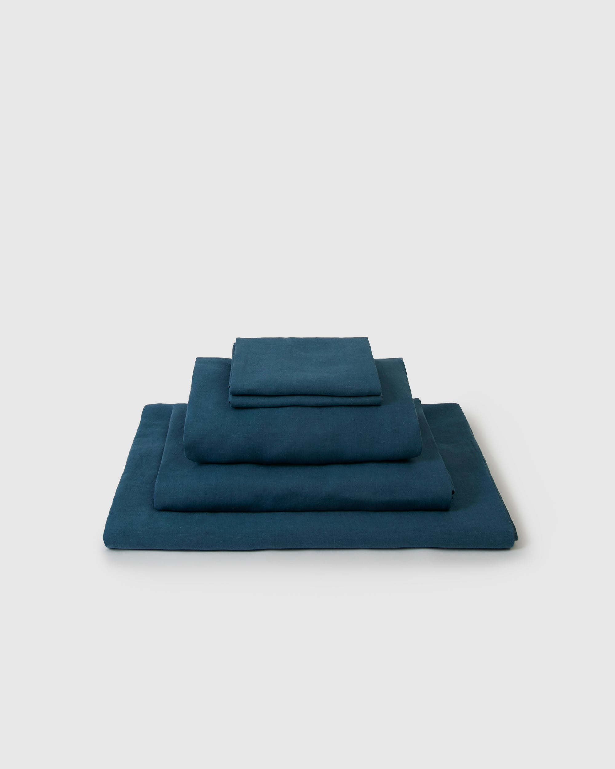 Linen sheets collection set in a dark blue adriatic indigo color