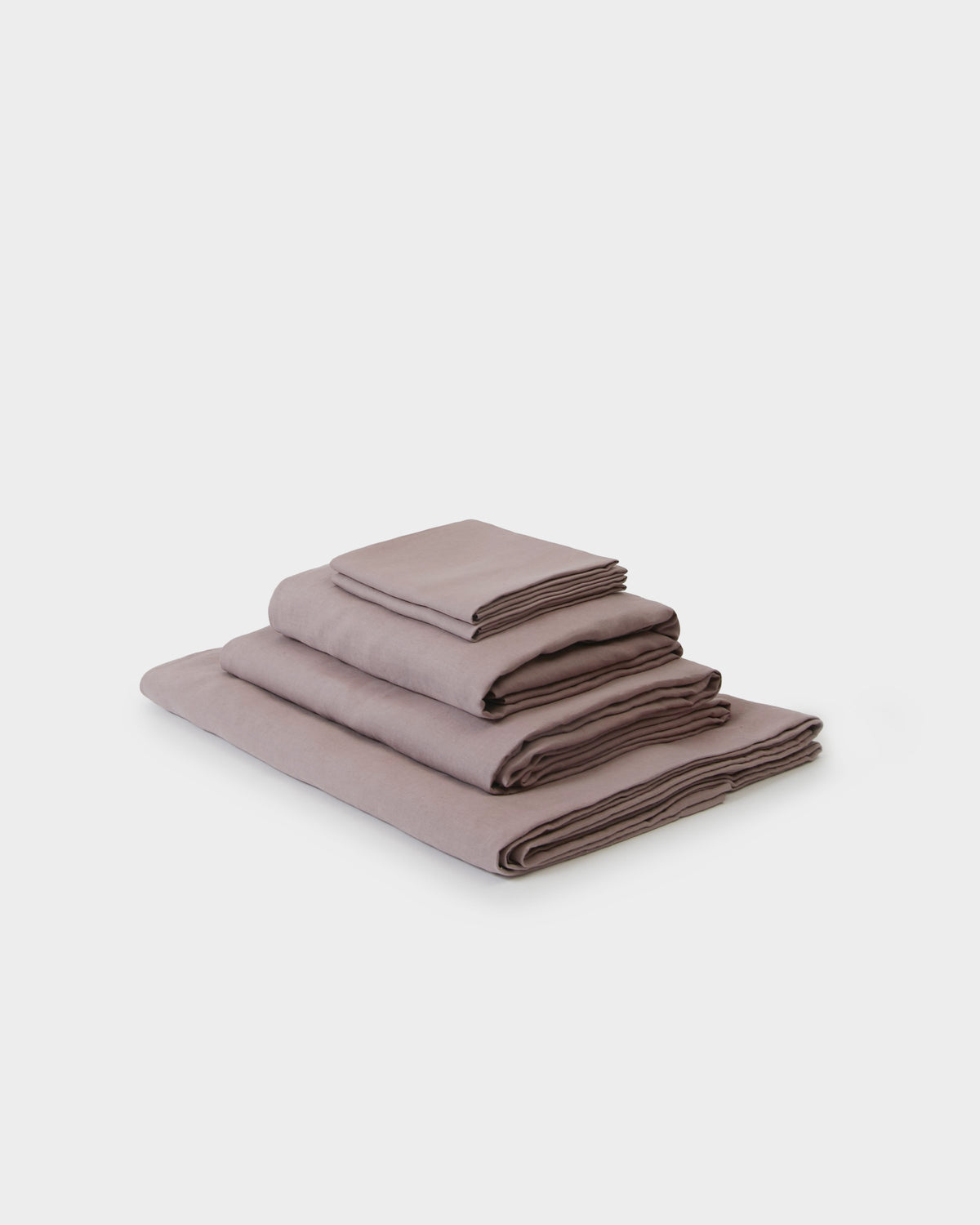 Side angle shot of a orchid pink sheet set