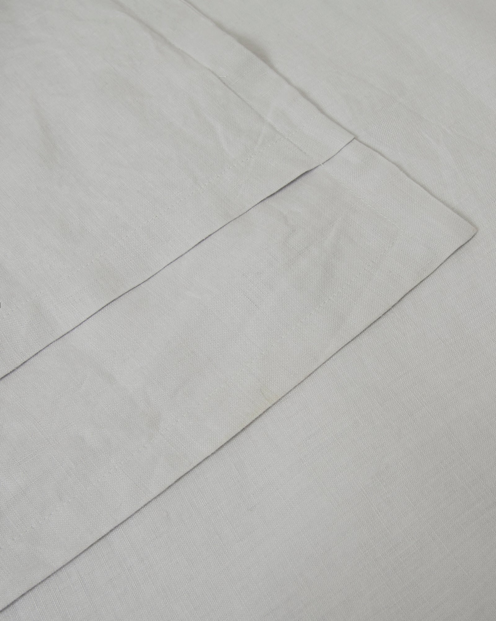 Pair of filled pillowcases in light blue glacier