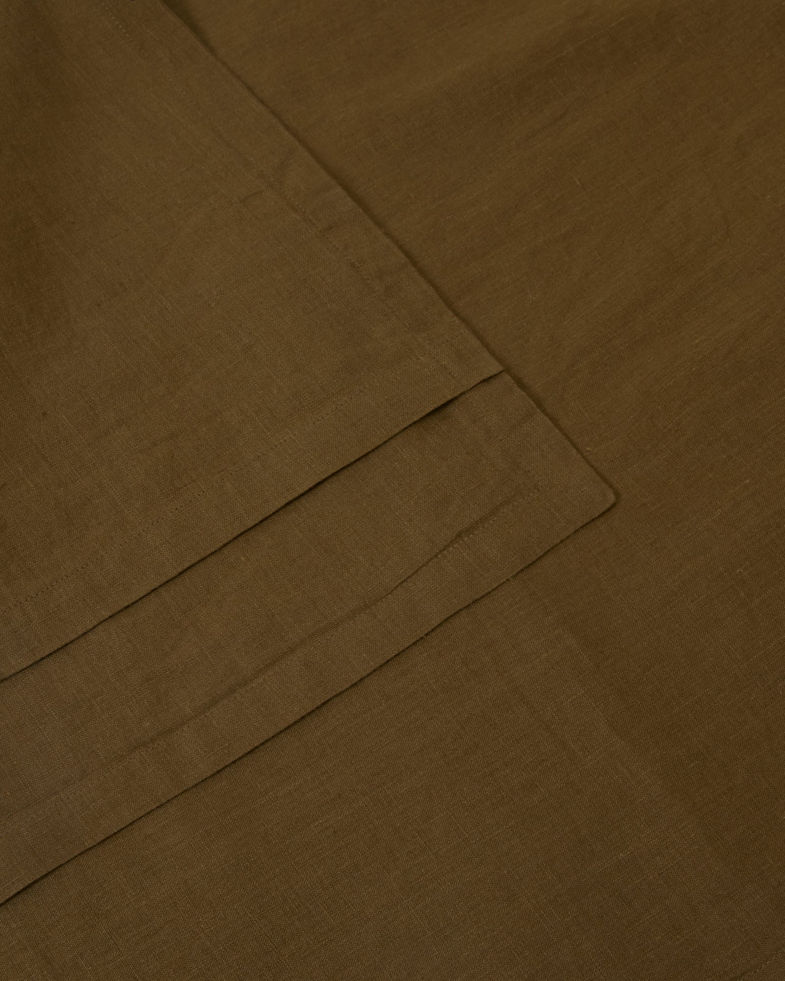 Pair of filled pillowcases in moss green