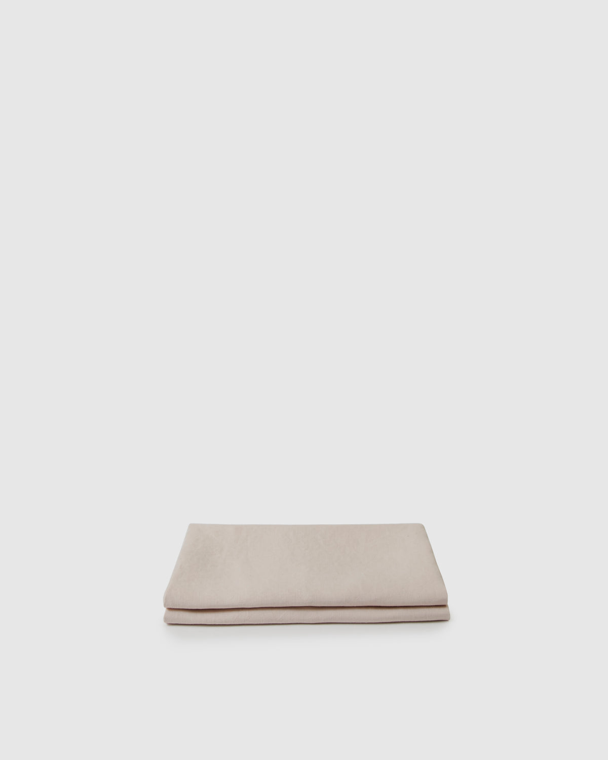 Top-folded pair of pillowcases in light pink blush