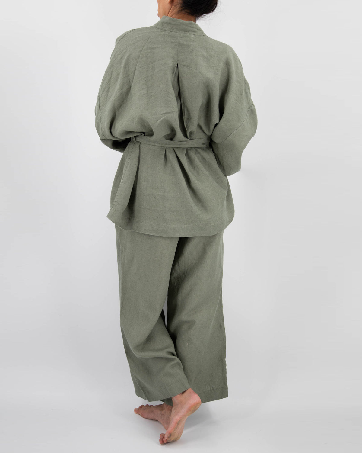 Back photo of kimono style loungwear set (top and pants) on model in khaki green