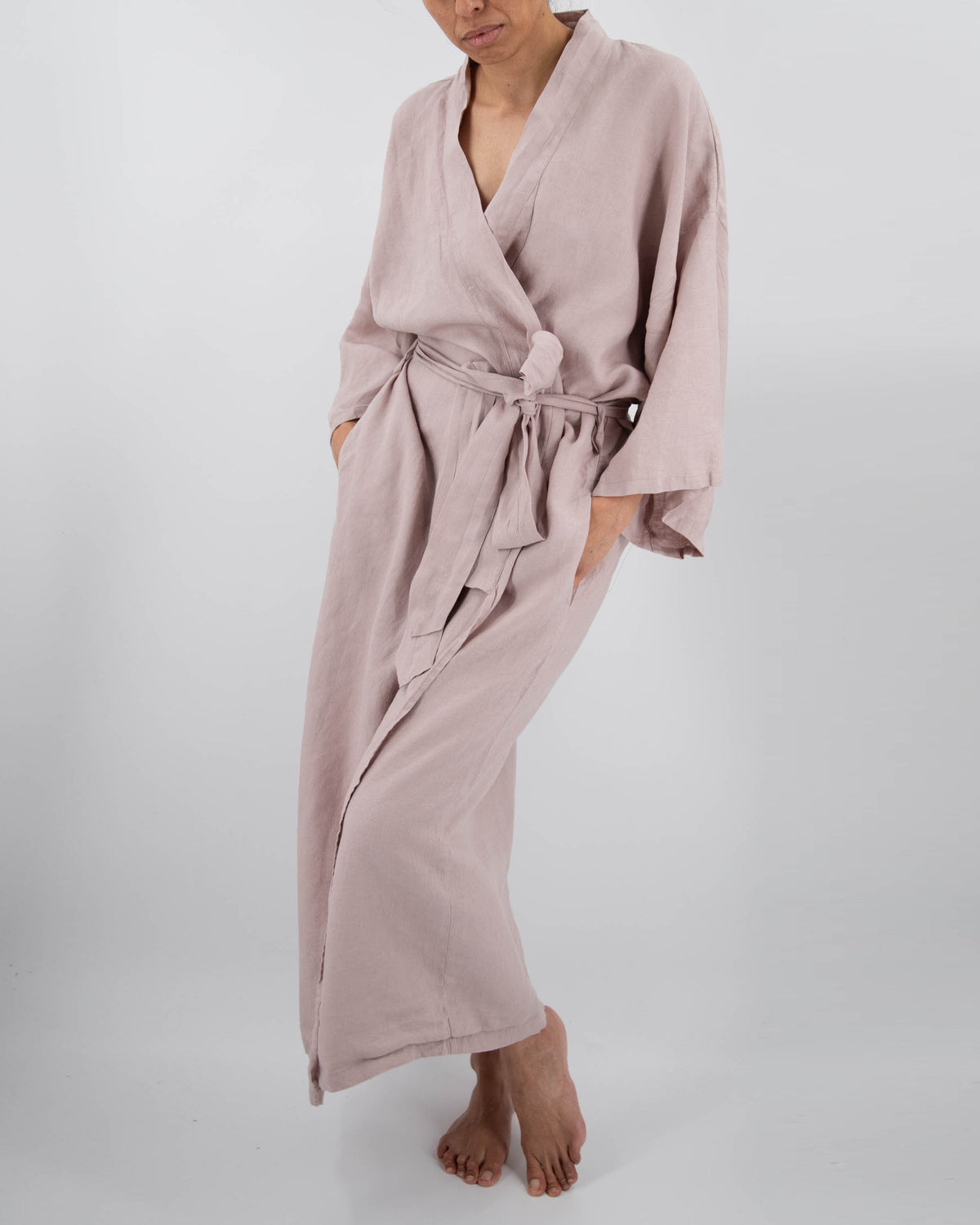 Full-length linen robe in bisque pink on model
