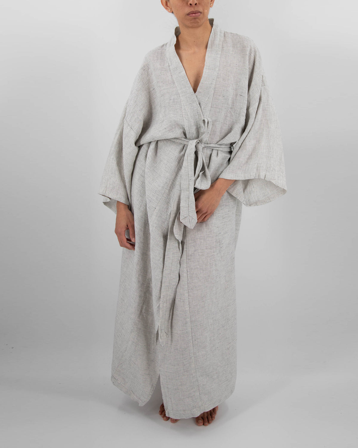 Full-length linen robe in pinstripe pattern on model
